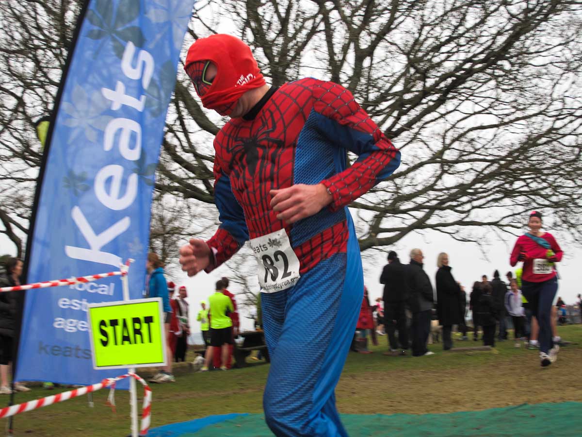 Paul Godber crosses the finish line