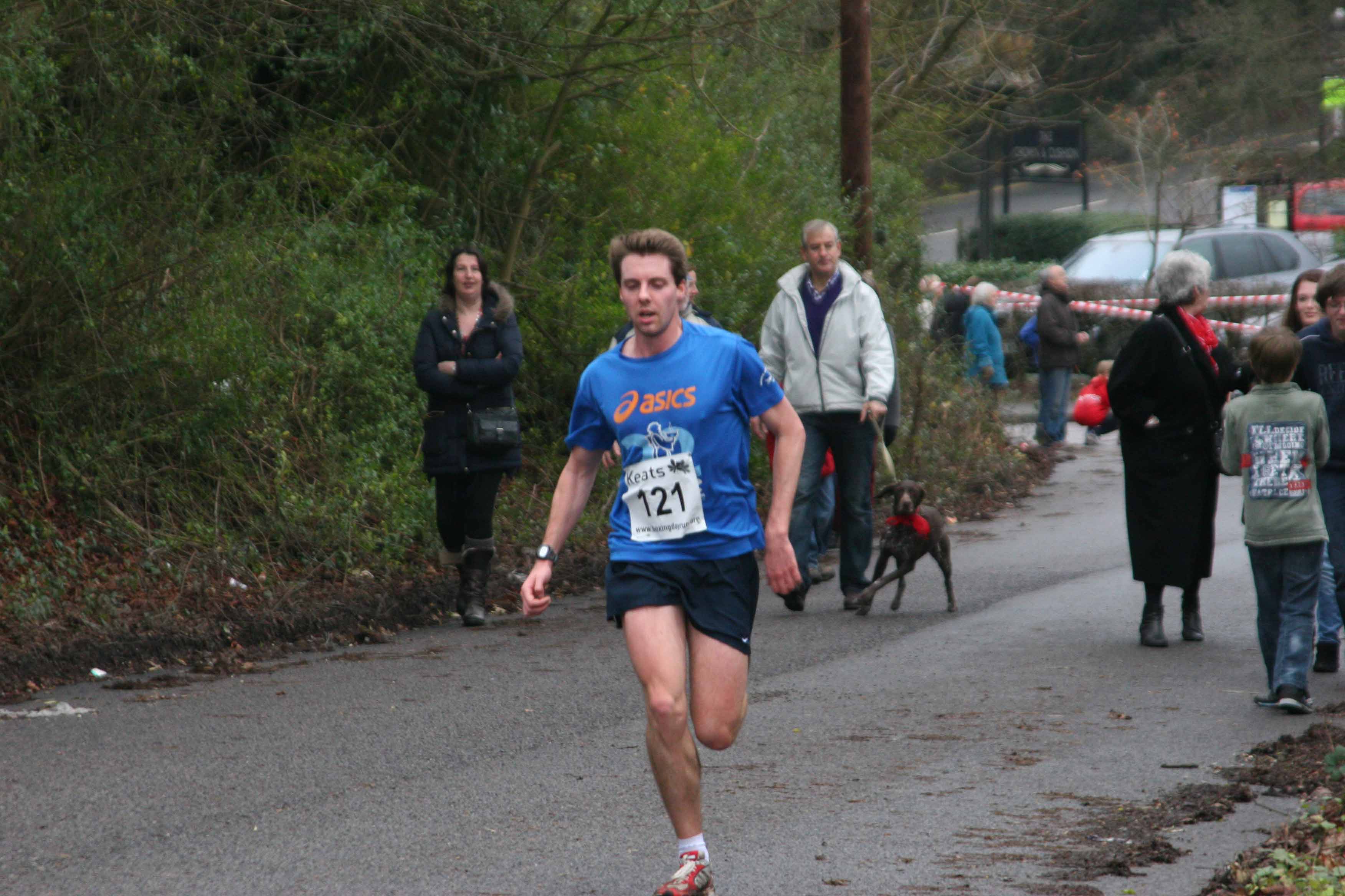 James McMullan heads home to win the Mens race