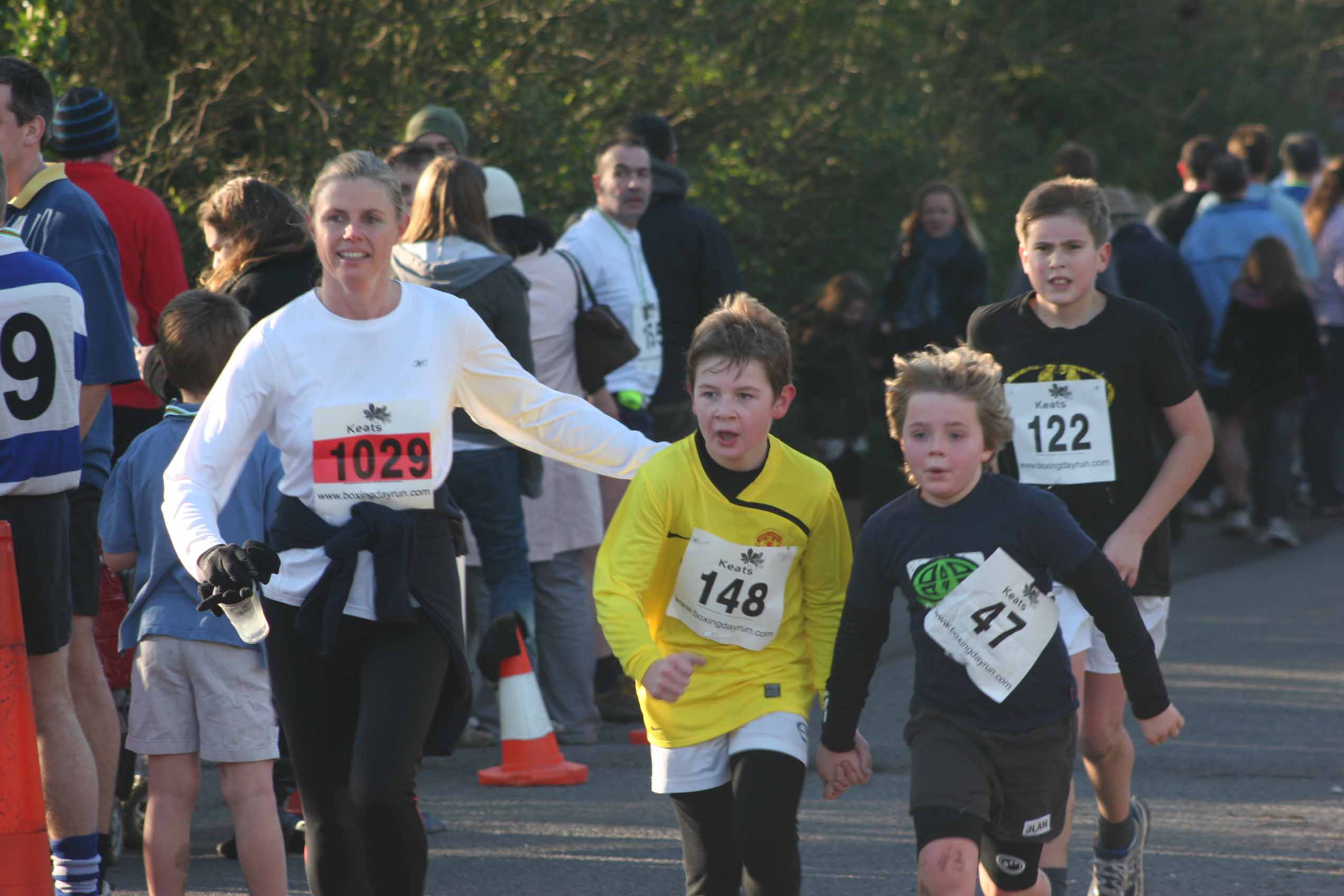 Karen Lance and the boys head for the finish